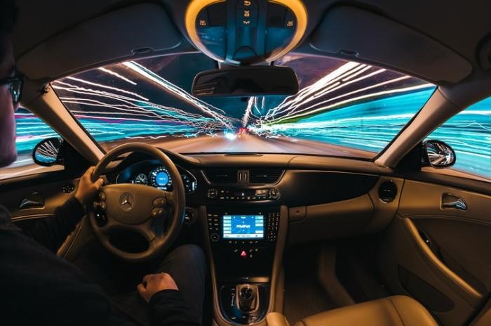 View of street lights from inside a car